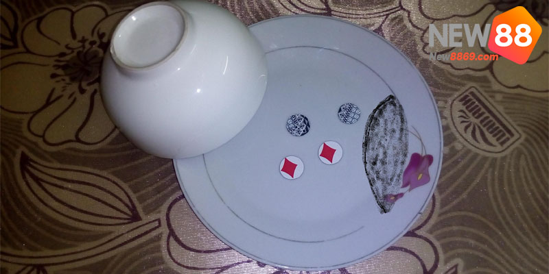 dụng cụ trò xóc đĩa
